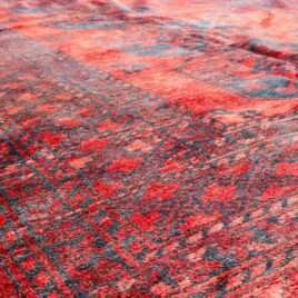 rich-red-elephant-foot-tribal-rug.jpg