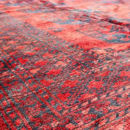 rich-red-elephant-foot-tribal-rug.jpg