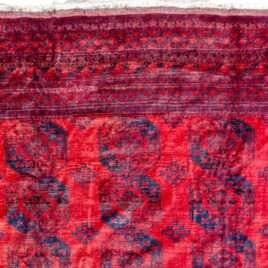 rich-red-elephant-foot-tribal-rug.jpg