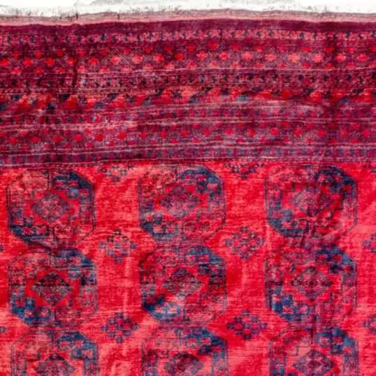rich-red-elephant-foot-tribal-rug.jpg