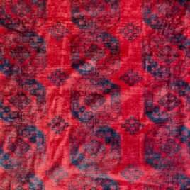 rich-red-elephant-foot-tribal-rug.jpg