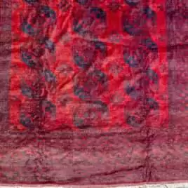 rich-red-elephant-foot-tribal-rug.jpg