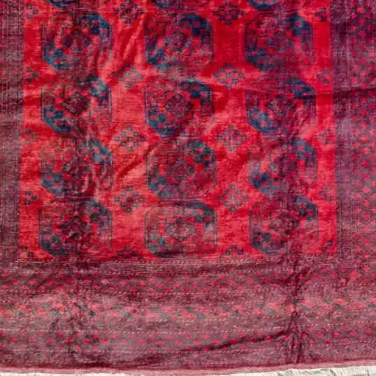 rich-red-elephant-foot-tribal-rug.jpg