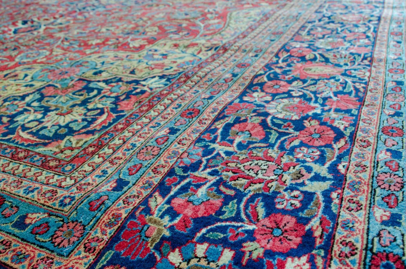 H409-Angle swirling-floral-red-ground-qazvin-rug.jpg